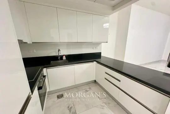 2-br-unit-in-amna-tower-brand-new-pool-view.webp