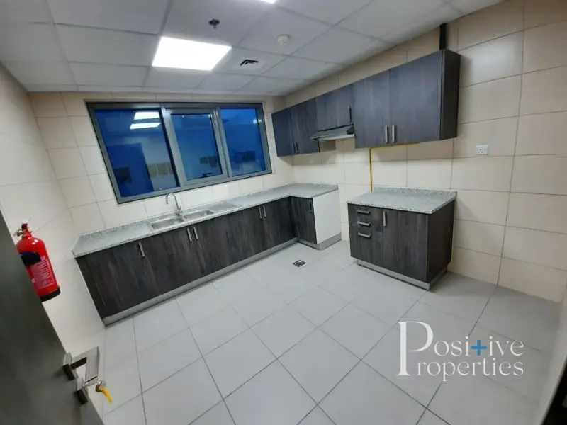 brand-new-2bhk-laundry-room-close-kitchen.webp