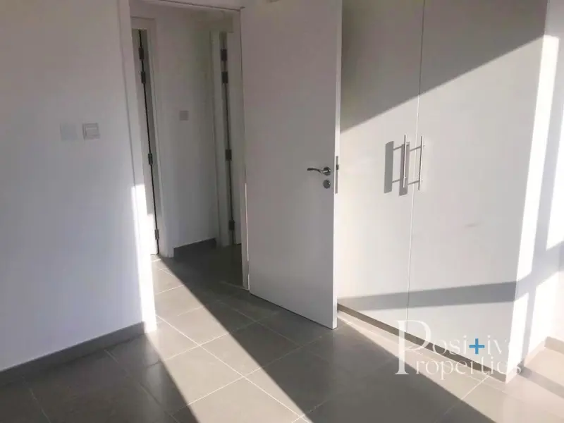 brand-new-bright-on-high-floor-walk-in-closet.webp