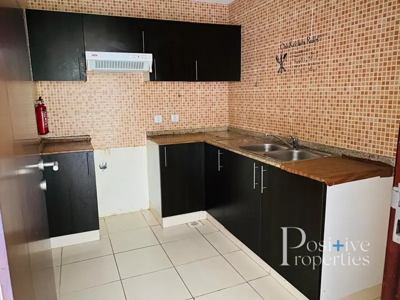budget-2-bed-limited-time-only-closed-kitchen.webp