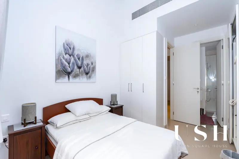 furnished-2-bed-both-ensuite-podium-pool-view.webp