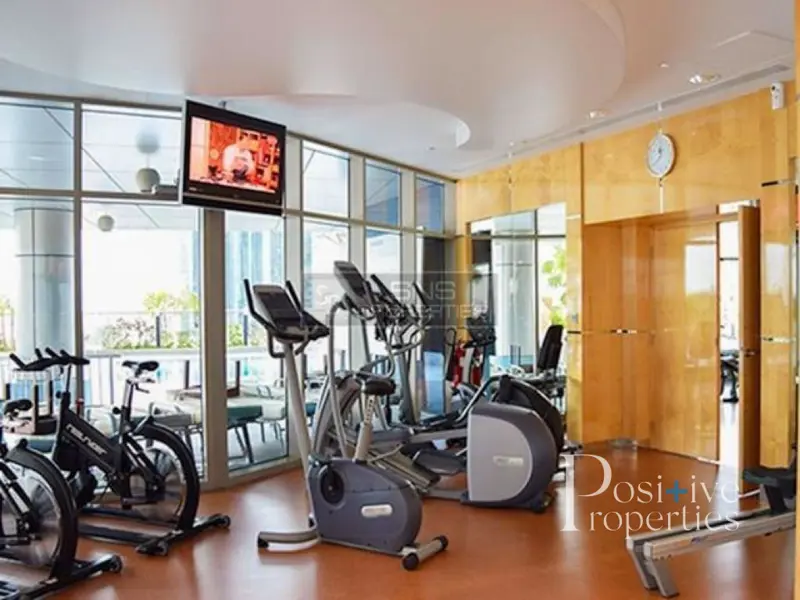furnished-indoor-gym-and-pool.webp