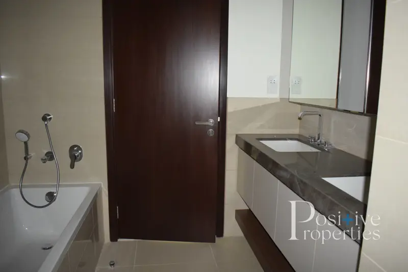 spacious-2-bed-l-chiller-free-ready-to-move.webp