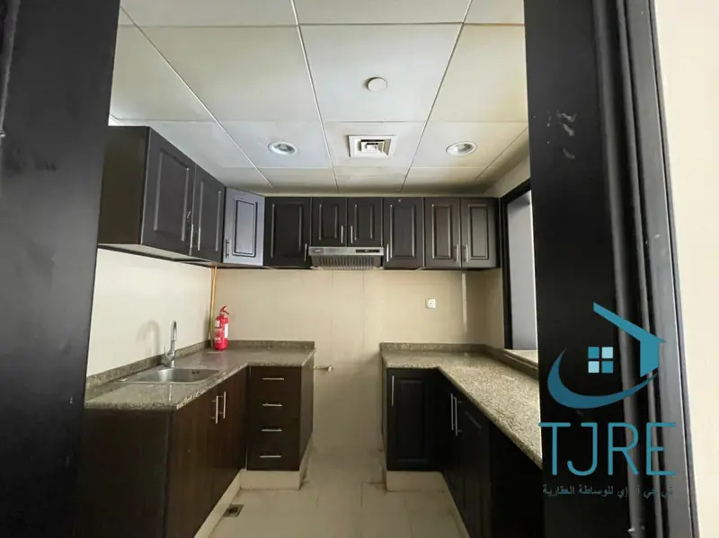 spacious-layout-elegant-1br-unfurnished-road-view.webp