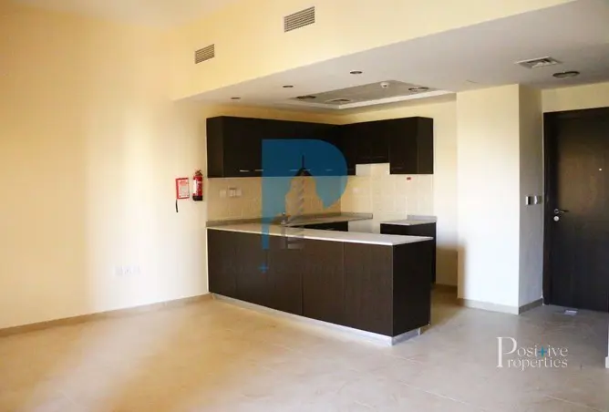 vacant-2br-well-maintained-open-kitchen.webp
